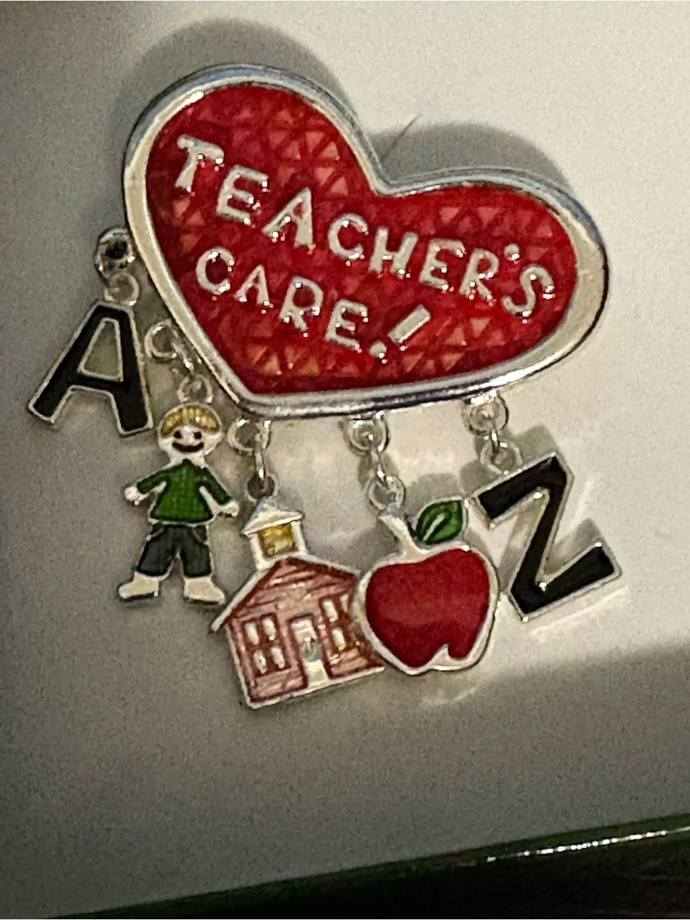 Teacher's Care Brooch red enamel heart with dangling charms. New in box.